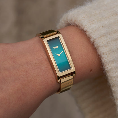 STORM LAILA GOLD TEAL WRIST 1